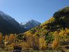 the San Juan mountains rising beyond the box canyon