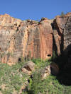 the notch in the wall is the long road tunnel into the Zion Park